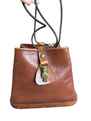 Vintage 1970s Artisan-Made Leather Bucket Bag with Dragon Medallion