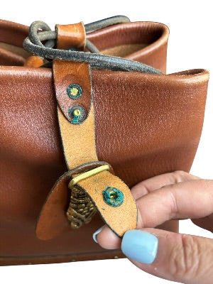 Vintage 1970s Artisan-Made Leather Bucket Bag with Dragon Medallion