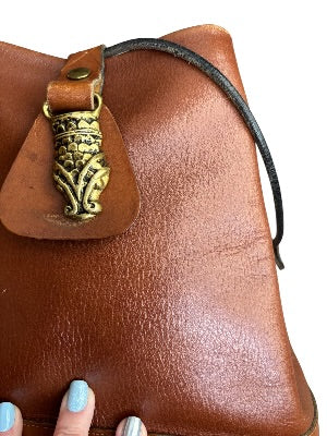 Vintage 1970s Artisan-Made Leather Bucket Bag with Dragon Medallion