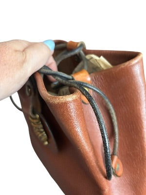 Vintage 1970s Artisan-Made Leather Bucket Bag with Dragon Medallion