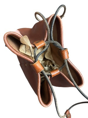 Vintage 1970s Artisan-Made Leather Bucket Bag with Dragon Medallion