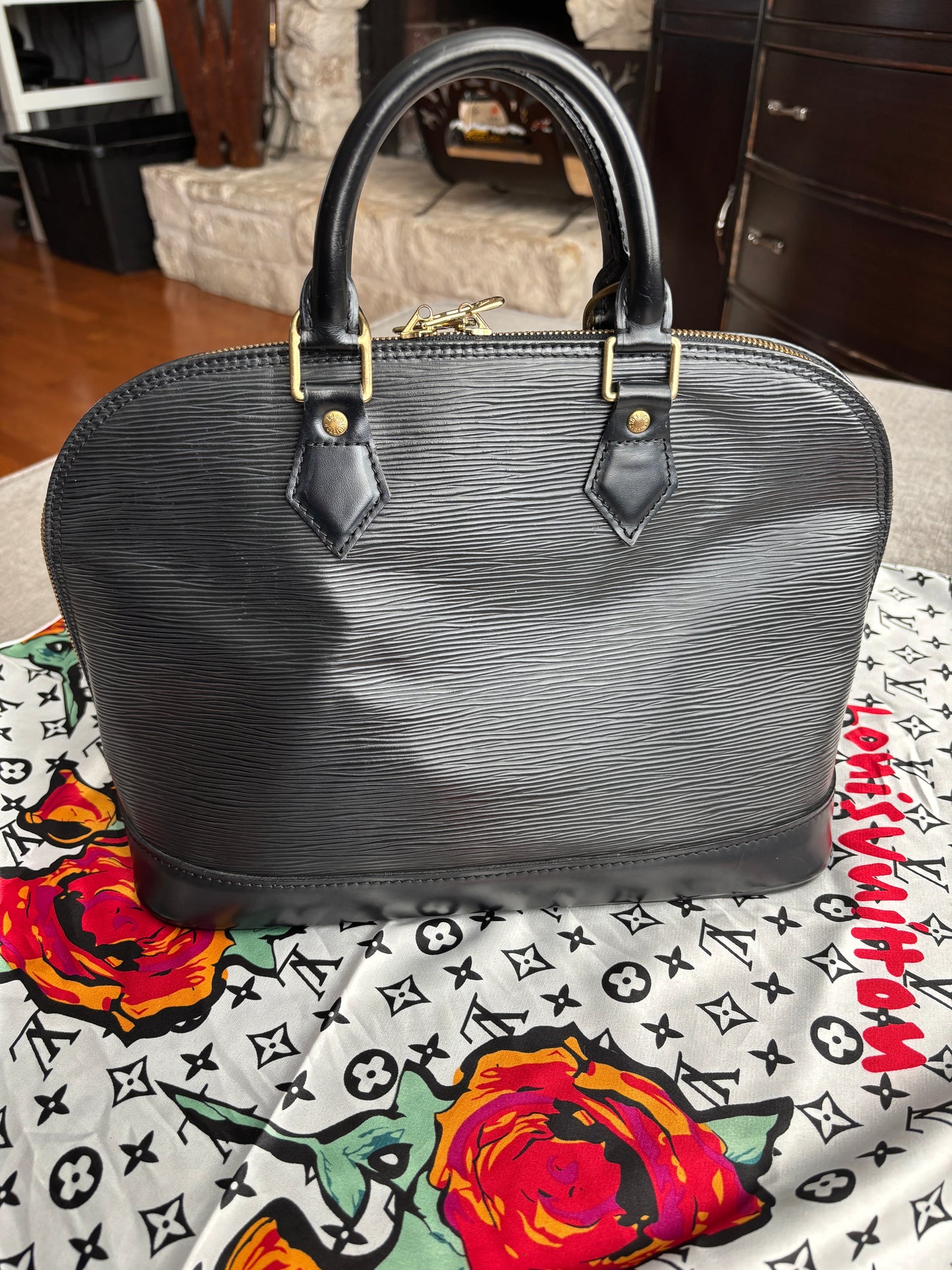 Louis Vuitton Alma Handbag in Black Epi Leather