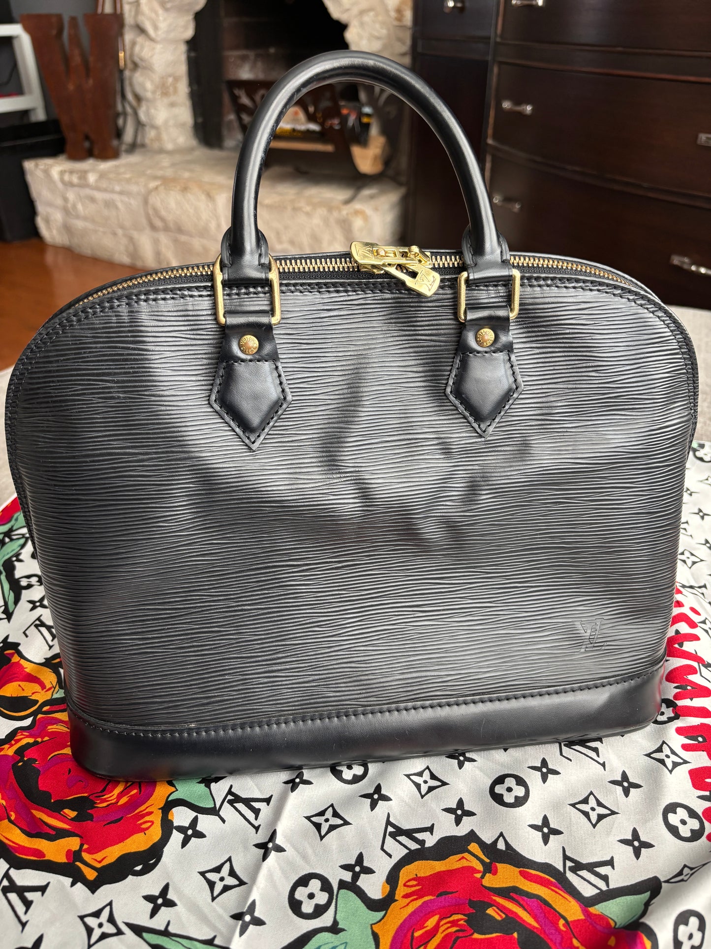 Louis Vuitton Alma Handbag in Black Epi Leather