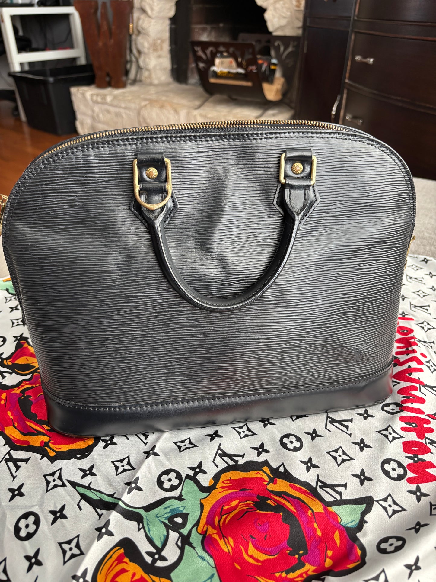 Louis Vuitton Alma Handbag in Black Epi Leather