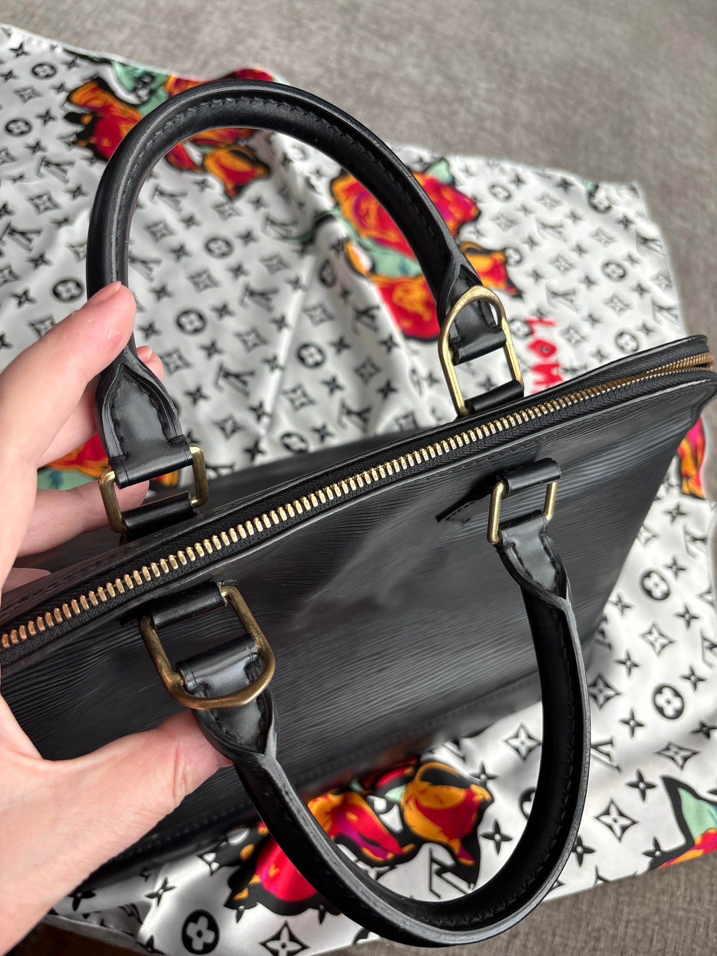 Louis Vuitton Alma Handbag in Black Epi Leather