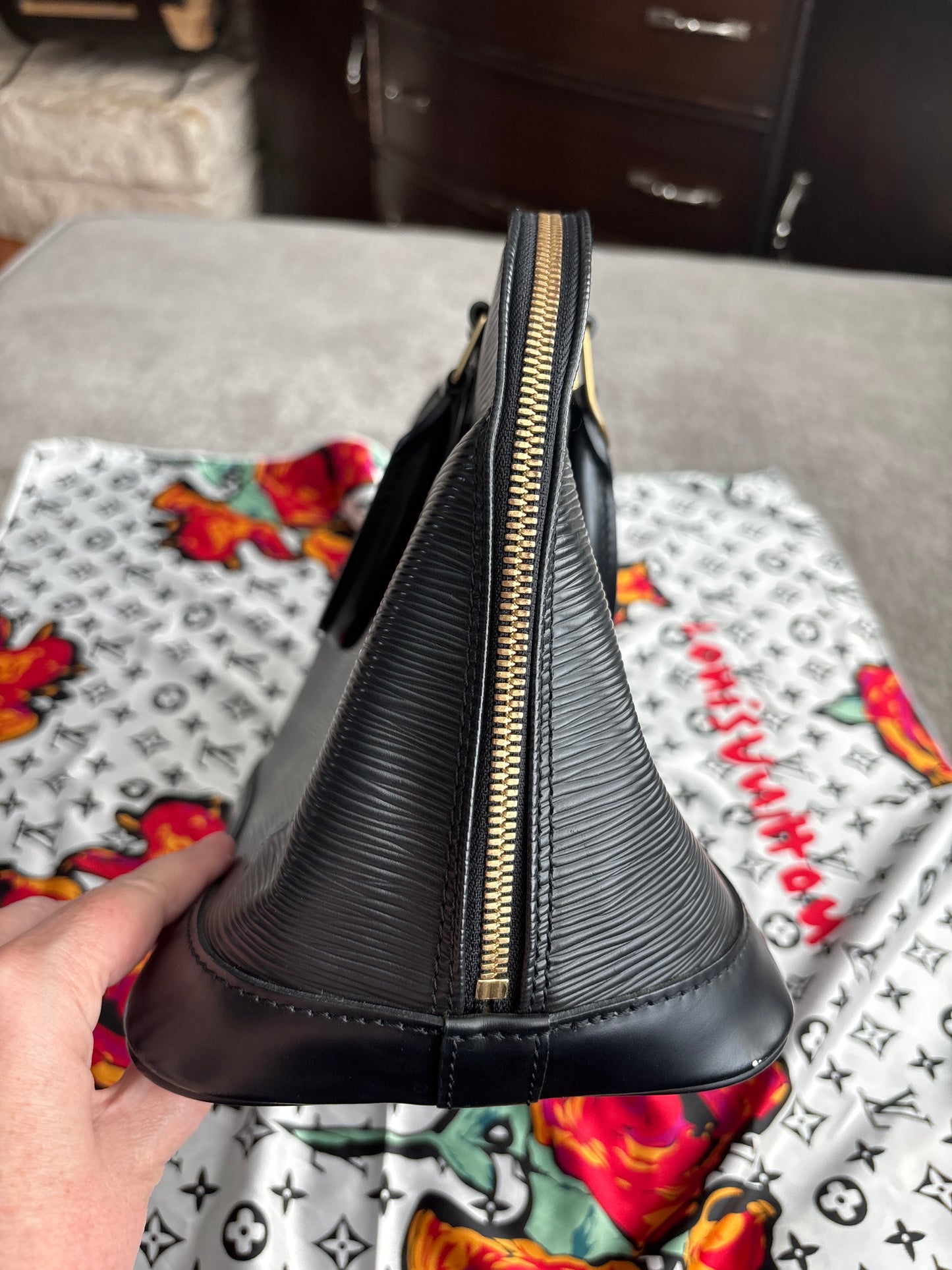Louis Vuitton Alma Handbag in Black Epi Leather